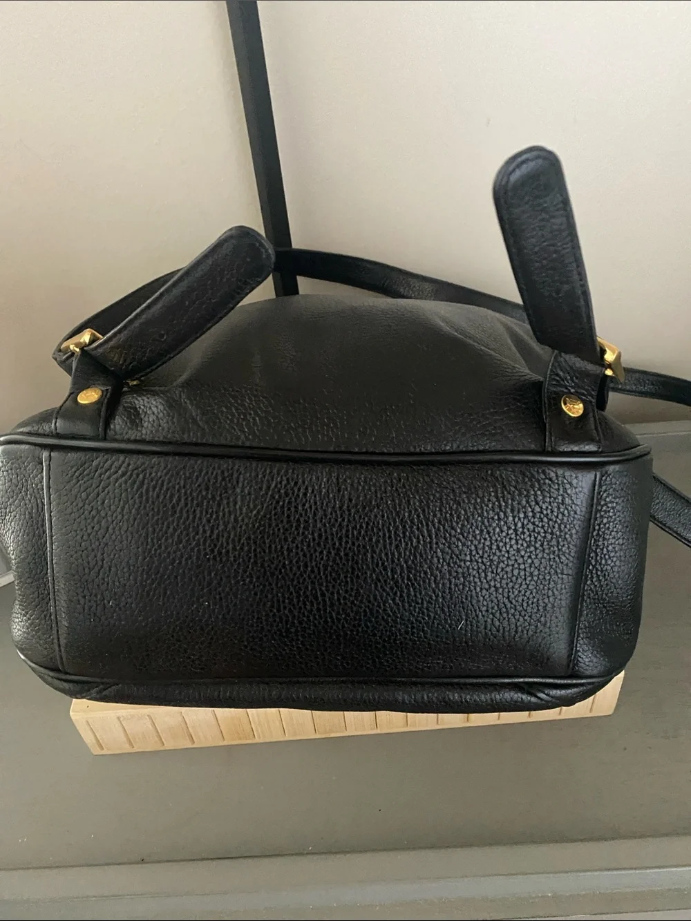 MCM Black Pebbled Leather Backpack with Gold Emblem Hardwarer